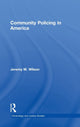 Book cover of: Community Policing in America. By: Jeremy M. Wilson