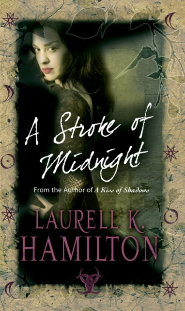 Book cover of: Stroke Of Midnight. By: Laurell K. Hamilton