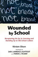 Book cover of: Wounded by School. By: Kirsten Olson