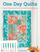 Book cover of: One Day Quilts. By: Suzanne McNeill