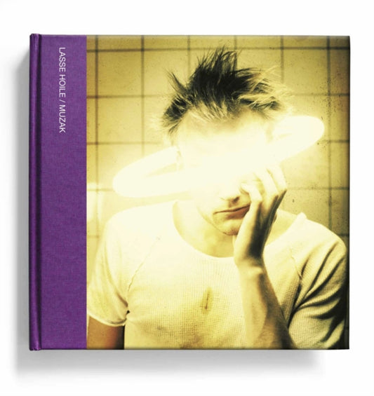 Book cover of: Muzak:The Visual Art of Porcupine Tree. By: Lasse Hoile