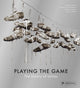 Book cover of: Playing the Game: The History of Adidas. By: Rainer Karlsch