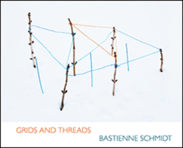 Book cover of: Grids and Threads. By: Bastienne Schmidt