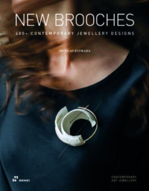 Book cover of: New Brooches: 400+ Contemporary Jewellery Designs. By: Nicolas Estrada