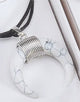 Book cover of: Amulet Pendant - White Magnesite