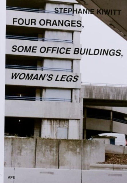 Book cover of: Four Oranges, Some Office Buildings, Woman’s Legs. By: Stephanie Kiwitt