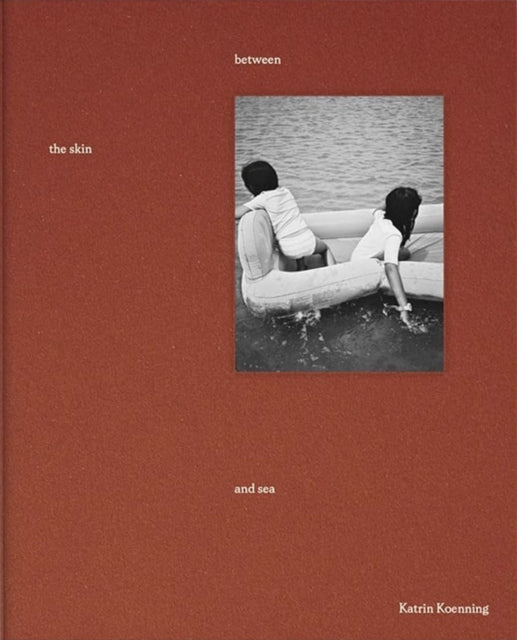 Book cover of: between the skin and sea. By: Katrin Koenning